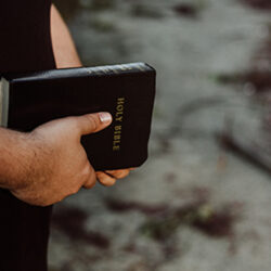 Man holding the holy bible